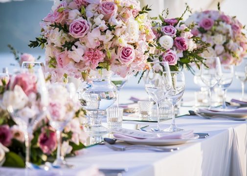 Table setting at a luxury wedding and Beautiful flowers on the table. Table setting at a luxury wedding and Beautiful flowers on the table.